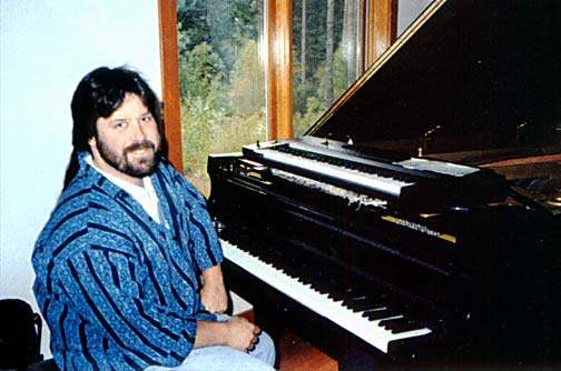 Buzz playing piano at Scott Cossu's house on Oyster Bay.